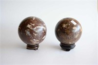 Pair of antique Santiago marble spheres