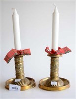 Pair of antique French pressed brass candlesticks