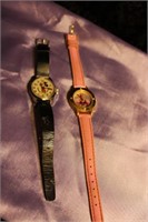 PAIR OF CHARACTER WATCHES