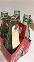 Lot of 4 Coca-Cola Bottles