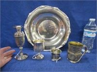 4 small antique plated items on round tray