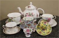 TEA POT AND SELECTION OF CUPS AND