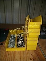 10 plastic storage trays, tool holders, lag bolts
