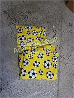 Yellow soccer Snuggie and blanket