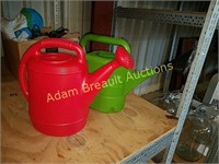 Two plastic watering cans, like new