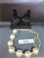BUDDHA FIGURE AND BEADED NECKLACE