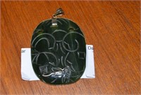 STERLING AND CARVED JADE PENDANT