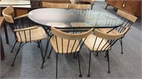 MID CENTURY IRON AND GLASS TABLE WITH SIX IRON AND