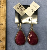 Pair of silver and faceted ruby tear dropped shape