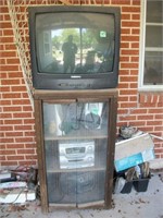 Outdoor cabinet with Sanyo TV and stereo