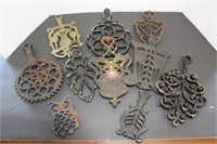 SELECTION OF CAST IRON TRIVETS