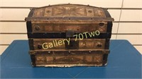 Antique doll trunk approximately 8 inches tall by