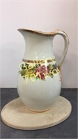 Large water pitcher with floral accents