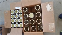 Two boxes of canning jars