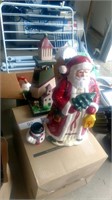 Ceramic santa, wooden lighthouse, snowmen