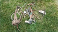 Leather hulters and chain lead and ice tong