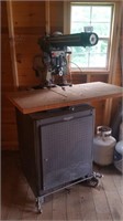 Craftsman 10" radial arm saw on stand with castors