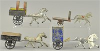 LOT OF FOUR SMALL HORSE CARTS