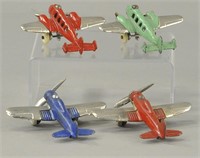 FOUR SMALL IRON AIRPLANES