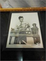 Framed photo of boy playing with Erector set