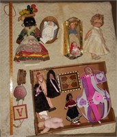 10 Dolls: Baby in wicker cradle,