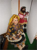 2 Dolls (Girl seated wearing sunflower