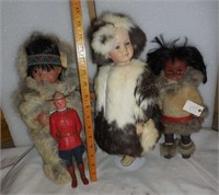 2 Eskimo Dolls, 1 Mountie & 1 Doll in fur