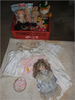 Elias Brothers red crate with about 6 dolls