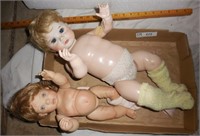 2 Baby Dolls with long hair and socks