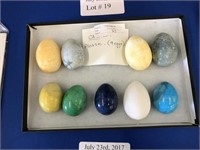 NINE POLISHED STONE EGGS IN VARIOUS COLORS