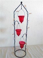 27" tall metal candle holder with 3 red hanging