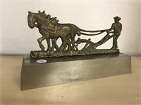 Cast Iron Man With Plow Horse Mounted On Metal