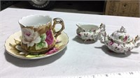 Cups and saucers and other pieces