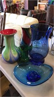 Four art glass vases and one art glass console