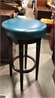 Turquoise and black barstool with a swivel seat,
