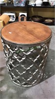 Cast metal round drum table with a wood insert,