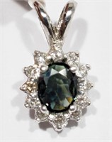 14K White gold 0.65 ct. oval sapphire pendant with