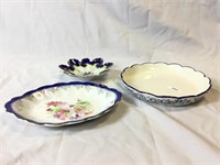 Two porcelain pieces and one ceramic pie plate