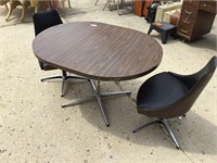Kitchen table & 2 padded swivel chairs