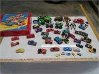 All of the toy cars and the carry case