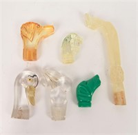 GROUPING OF CARVED LUCITE CANE HEADS