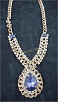 Brass Color Necklace W Blue Gemstone Center