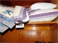 Pillows and quilted, embroidered store purchased