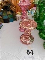 4 pink mercury looking illuminated candlesticks,