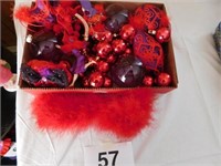 Box of red decorations for Red Hat