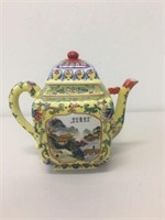 A Chinese yellow ground porcelain teapot