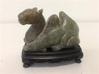 A Chinese dark celadon jade Ming style camel