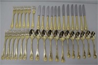 Versace gold plate Medusa flatware set for six