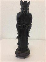 A  Chinese carved scholar figure