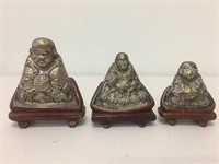 Three Chinese white metal Buddhas